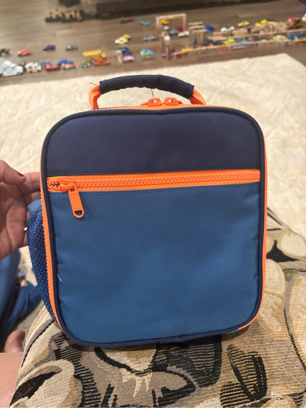 Pottery barn kids! 
Blue/Navy/Orange Astor Lunch Box